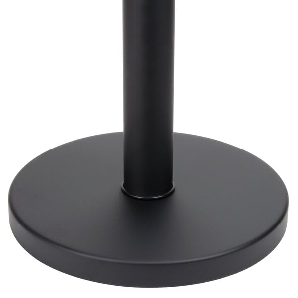 A black metal stanchion base for Aarco crowd control stanchion.