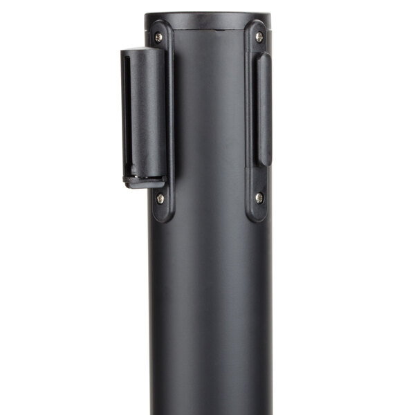 A black metal cylinder with a black handle.