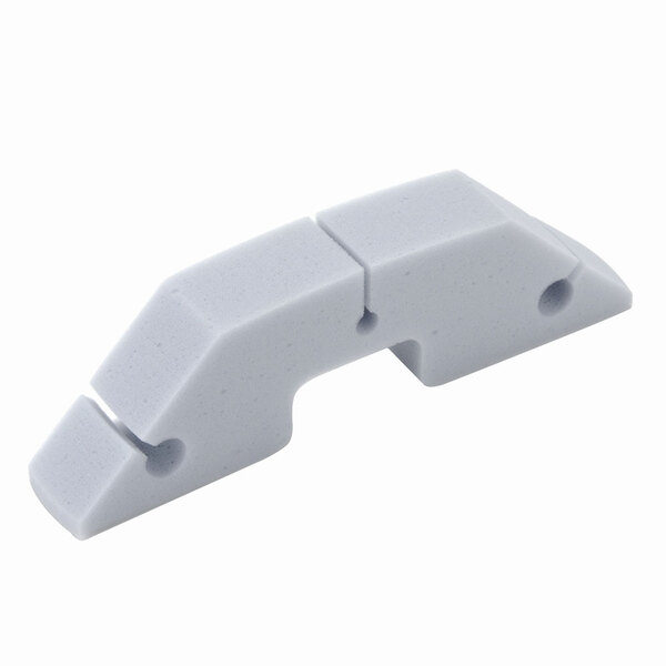 A white plastic Waring rear foam baffle with two holes.