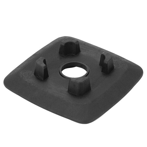 A black plastic square Waring jar pad with a hole in the middle.