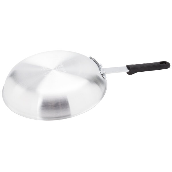 A Carlisle aluminum non-stick frying pan with a black handle.