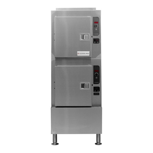 A stainless steel Cleveland SteamCraft Gemini natural gas floor steamer with two doors and buttons.