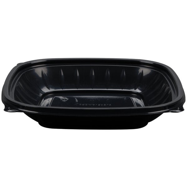 A Dart black plastic food container.