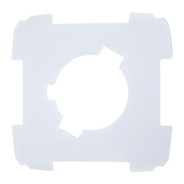 A white circular plastic piece with a hole in the center.