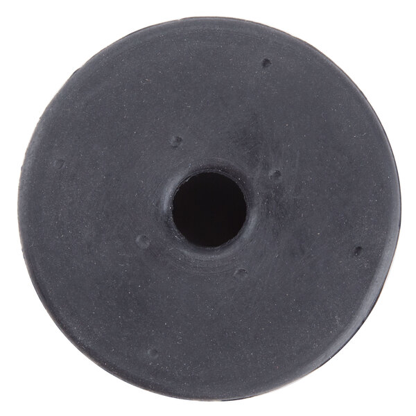 A black rubber circle with a hole in it.
