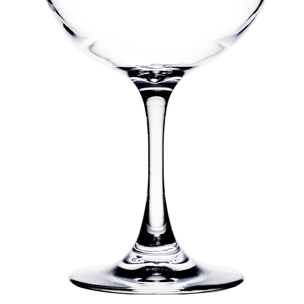 A clear wine glass with a stem.