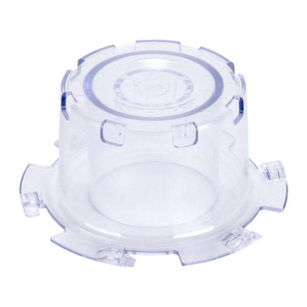 A clear plastic lid baffle for a Waring blender.
