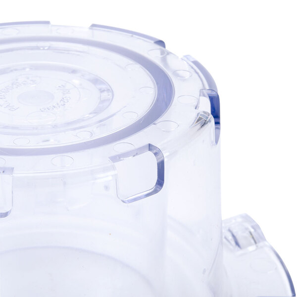 A clear plastic container with a blue top.