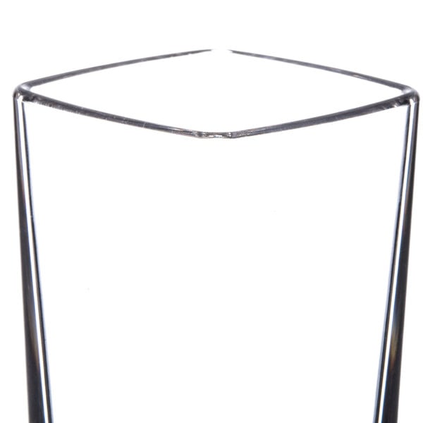 A close up of a clear plastic Thunder Group square shooter/dessert shot glass.