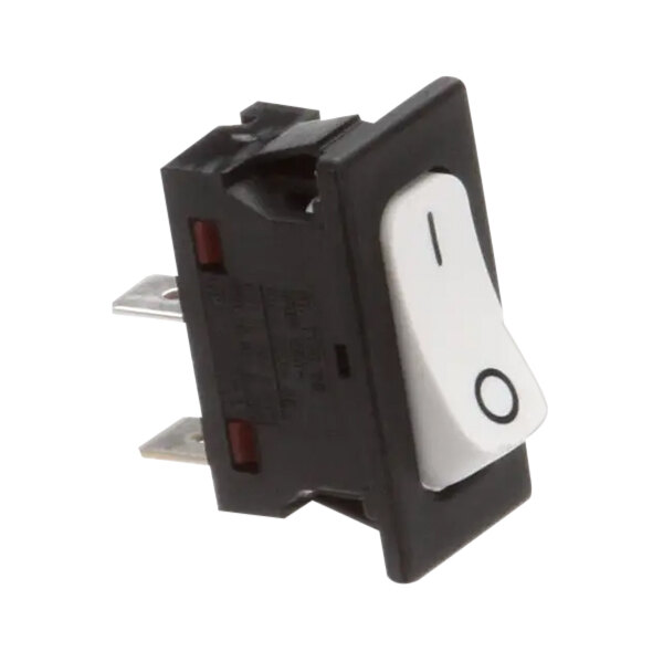 A Grindmaster-Cecilware switch with a white button
