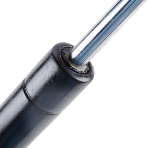 A close-up of a black metal rod.