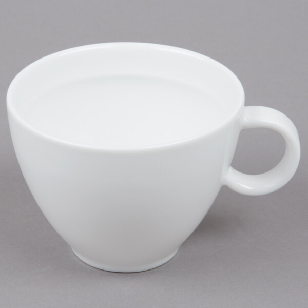 An Arcoroc white cup with a handle.