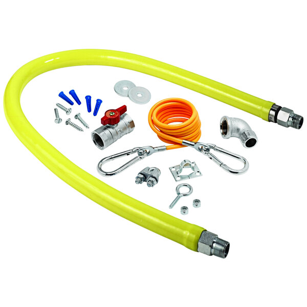 A yellow T&S gas appliance connector hose with installation accessories.