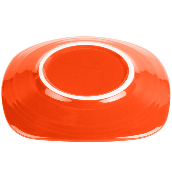A red square Fiesta® china salad plate with a white rim.