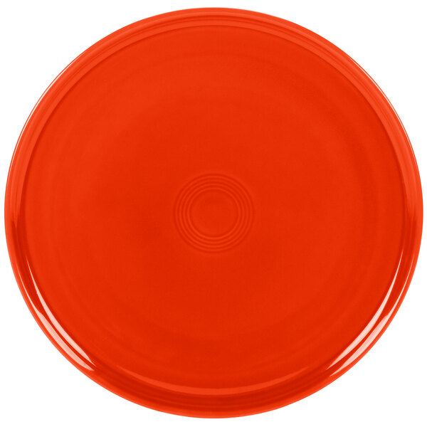 A red Fiesta China baking tray with a circle pattern and a black border.