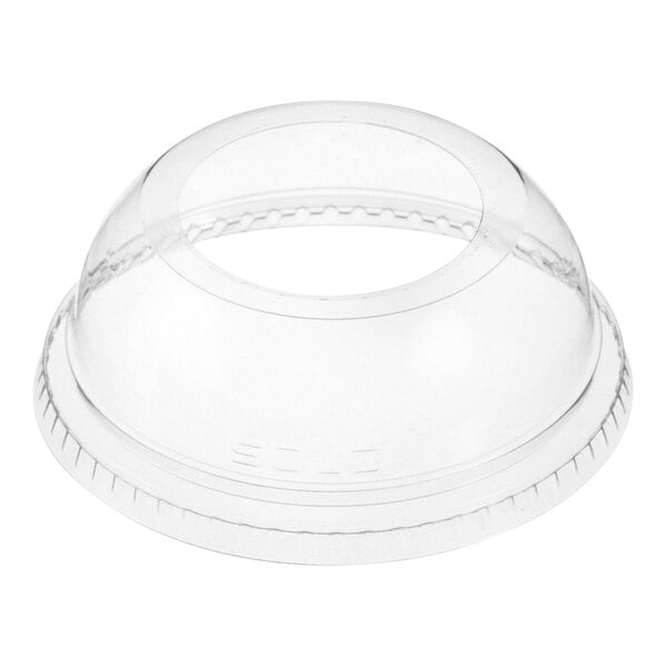 A clear plastic dome lid with a hole in it.