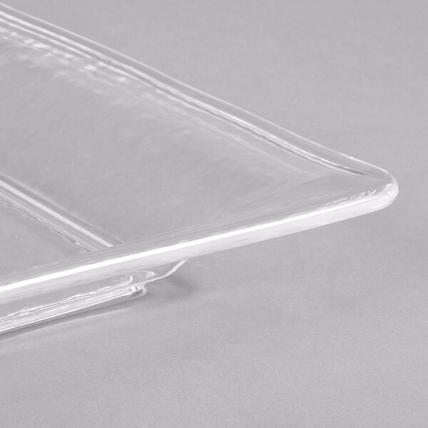 An American Metalcraft clear rectangular styrene platter with a handle.