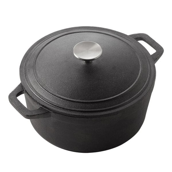 An American Metalcraft black cast iron Dutch oven with a lid.