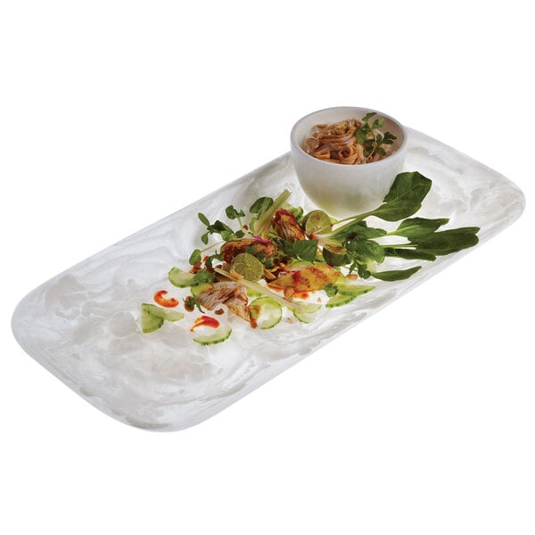An American Metalcraft Translucence Collection white plastic platter with a bowl of noodles and vegetables.