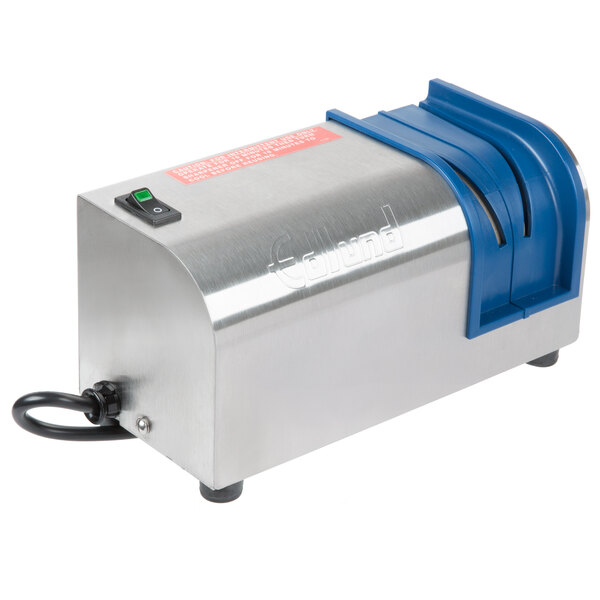 A silver and blue Edlund 230V electric knife sharpener on a counter.