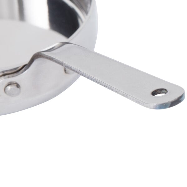An American Metalcraft stainless steel mini fry pan with a metal handle.