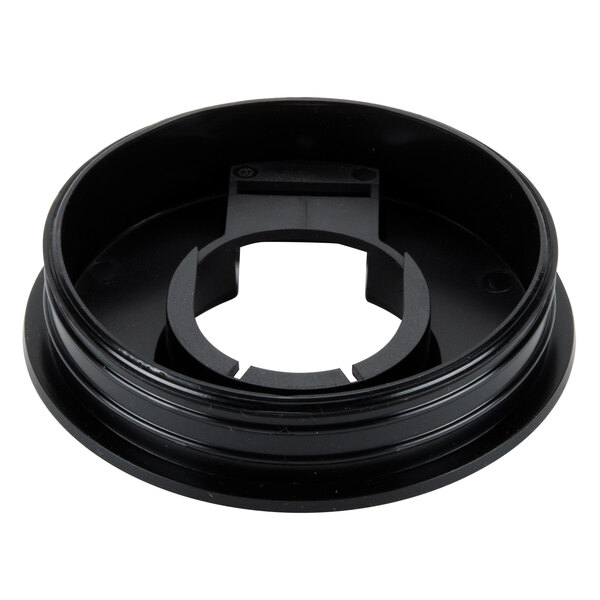 A black circular lid with a hole in the center.