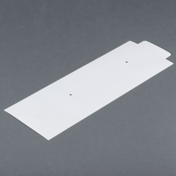 A white rectangular motor shroud for a Waring blender with holes in it.