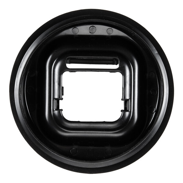 A black circular Waring outer jar lid with a square hole.
