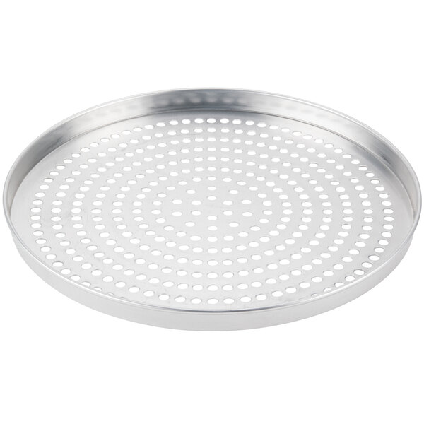 An American Metalcraft aluminum pizza pan with holes in the bottom.