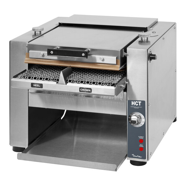 A Star HCT-13 conveyor toaster on a counter with the lid open.