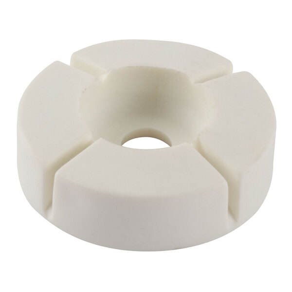 A white circular Waring housing seal with a hole in the middle.