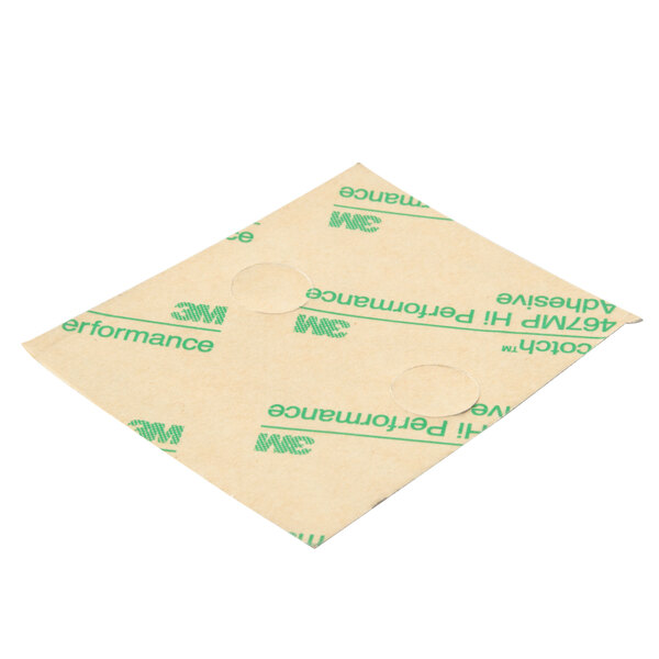 A piece of paper with green text reading "Waring 26402" on it.