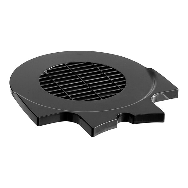 A black circular cover with a grid on top.