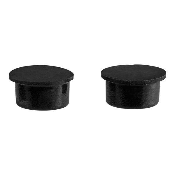 Two black rubber feet with a white background.