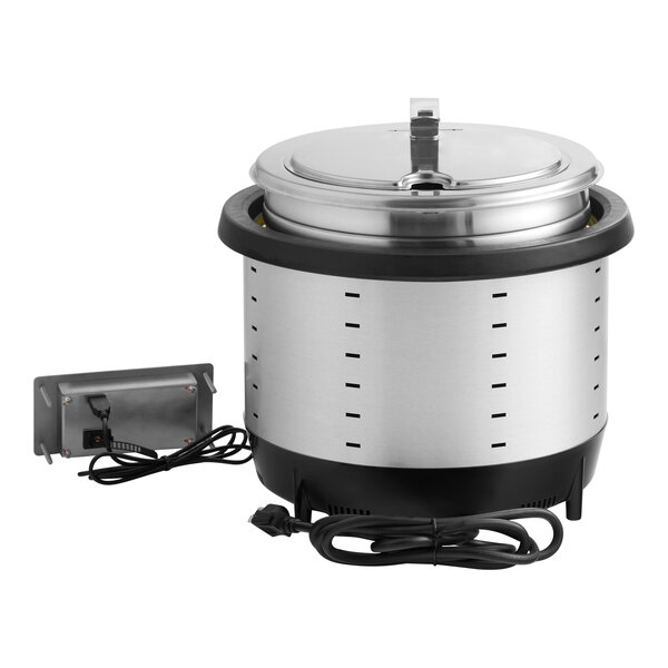 A stainless steel drop-in induction warmer with a lid and attached power cords.
