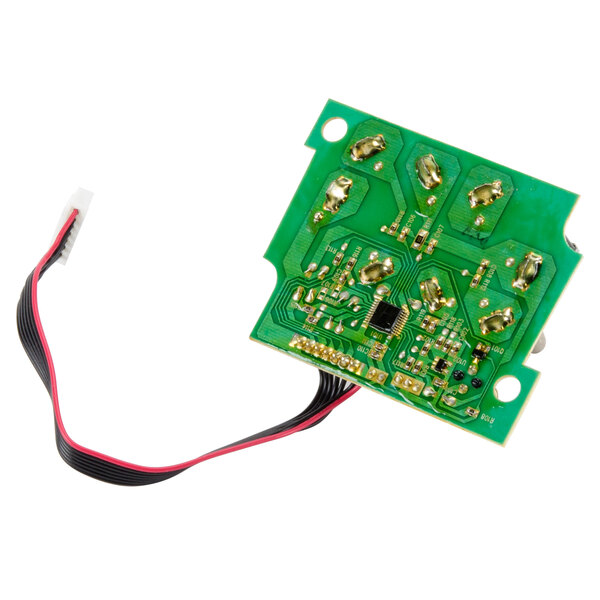 A green circuit board with black and red wires.