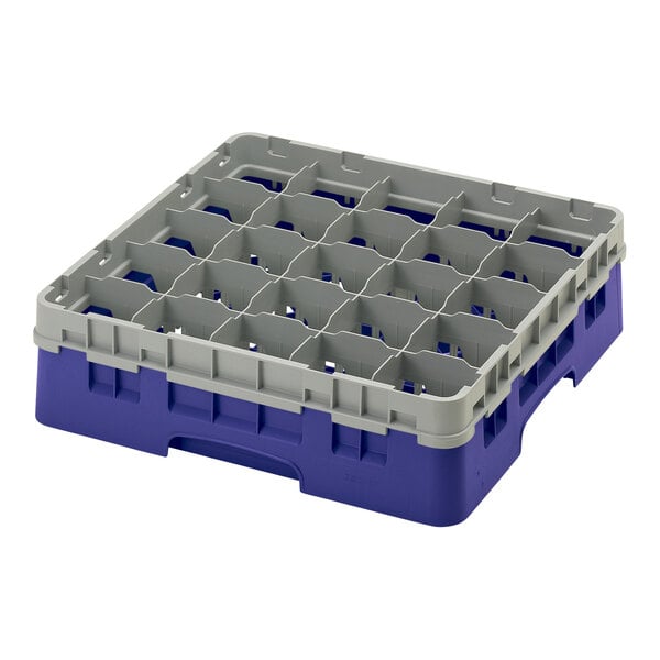 A navy blue plastic Cambro glass rack with grey compartments inside.