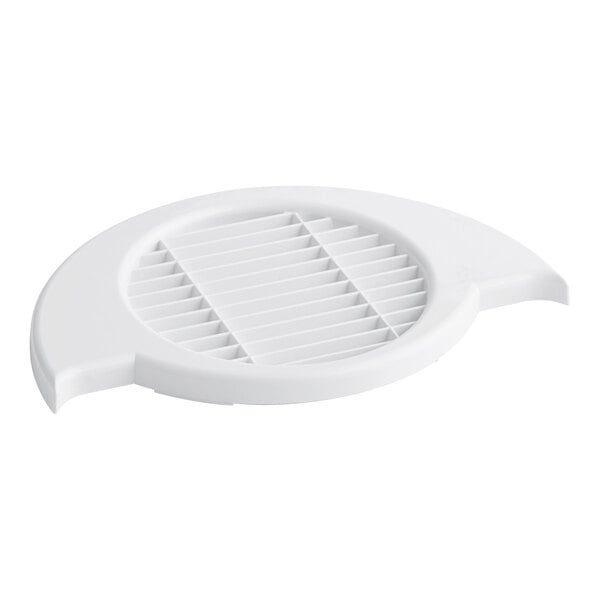 A white plastic round drain cover with holes.