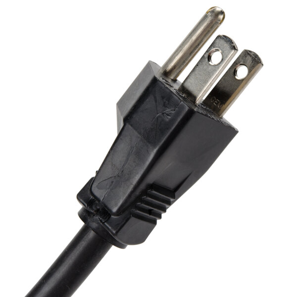 A close-up of a black Waring power cord with two plugs on it.