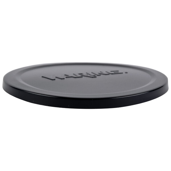 A black plastic lid with the word "WSG" on it.