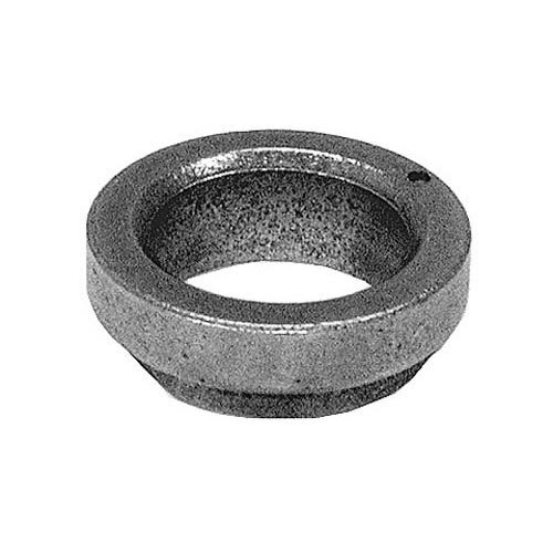 A close-up of a round metal Waring motor bushing with a hole in it.