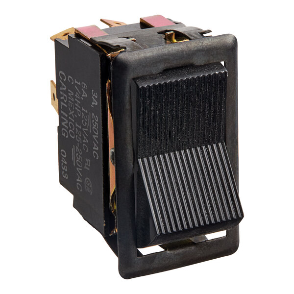A black rectangular switch with a black square cover.