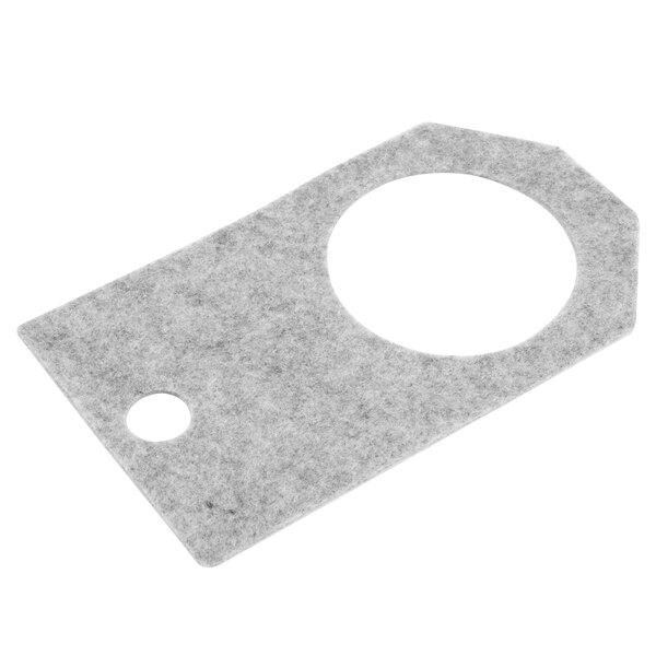 A grey rectangular Waring felt pad with a white circle in it.