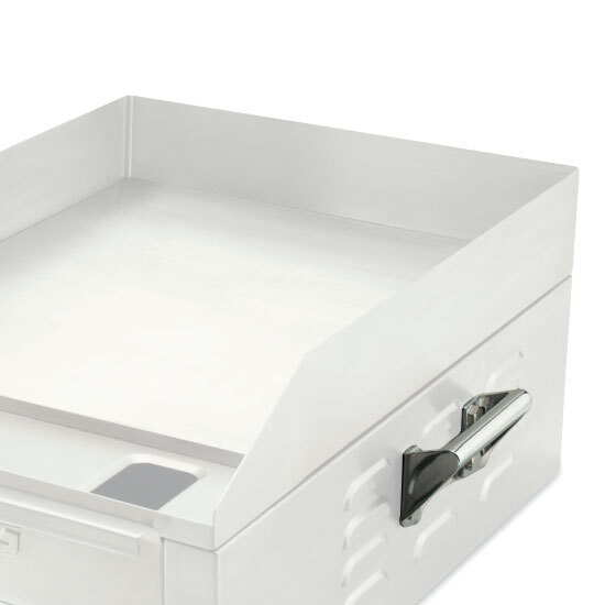 A white metal box with a silver handle.