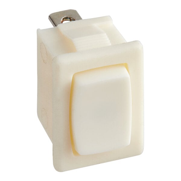 A white plastic Bunn rocker switch with a white button.
