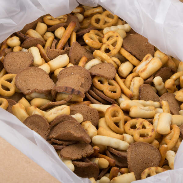 A white paper box of Deluxe Snak-ens Mix with a pretzel and cracker on the label.