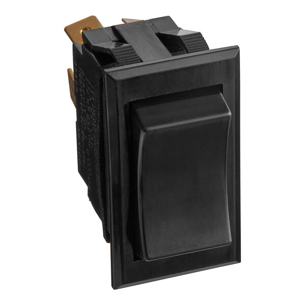 A black rectangular switch with a black button.