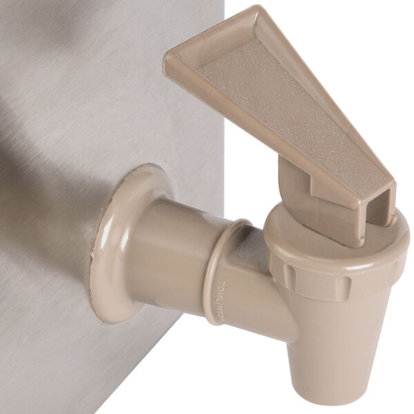 A Steril-Sil countertop condiment dispenser with stainless steel cylinders in a bottle rail.