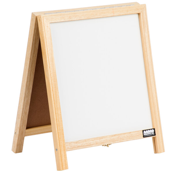 a white board with a brown background