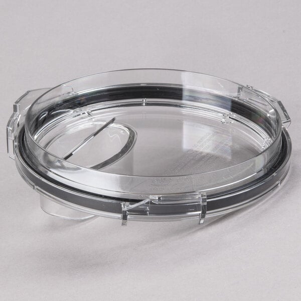 A clear plastic lid with a black ring.